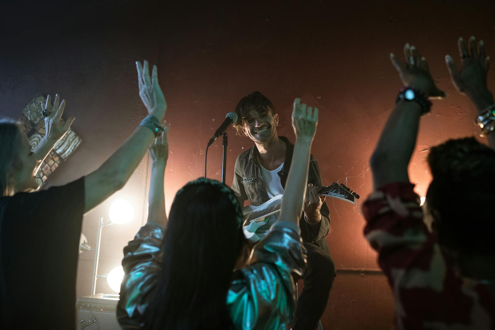 Navigli district, bars, clubs, and live music venues, Women Raising their Hands while Dancing